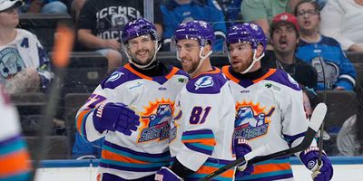 Orlando Solar Bears players on the ice during a game.